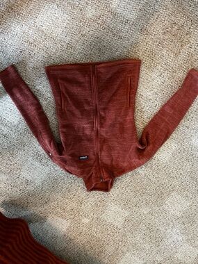 Patagonia zip-up fleece in rust pink
